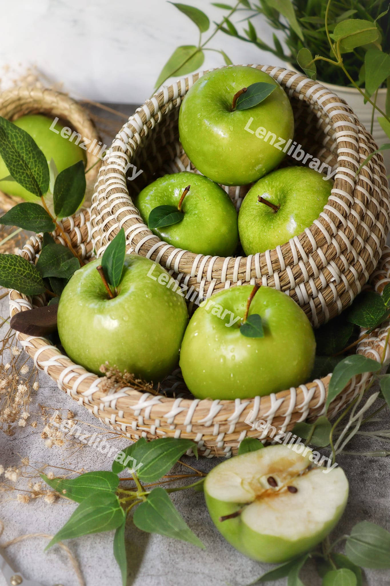 Green apples inside a basket